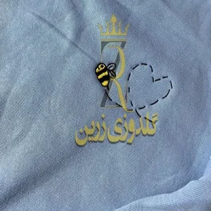 گلدوزی روی لباس