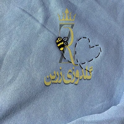 گلدوزی روی لباس